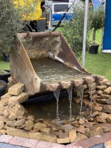 Digger bucket water feature - Norfolk Show