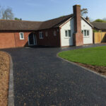 Hot tar and golden pre-coated spec driveway with charcoal edgings 3 - Halesworth