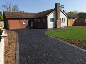 Hot tar and golden pre-coated spec driveway with charcoal edgings 3 - Halesworth