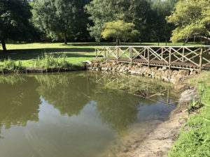 Stone retaining wall with bridge - Norfolk