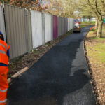 Rolling in tarmac for pathway